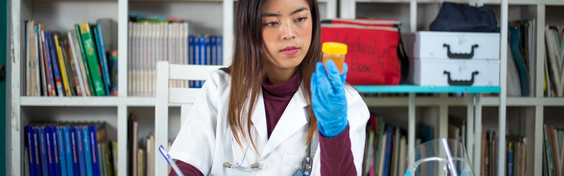 doctor testing urine